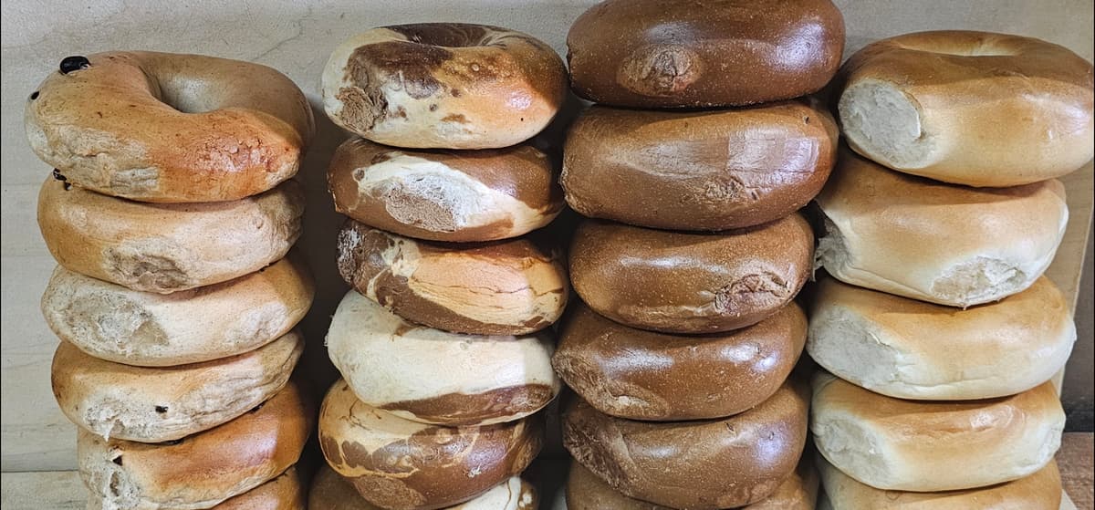 Handcrafted specialty bagel sandwich with rich toppings